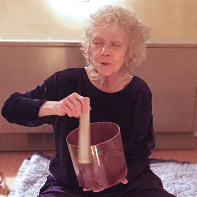 Sylvia Moss playing a Crystal Bowl